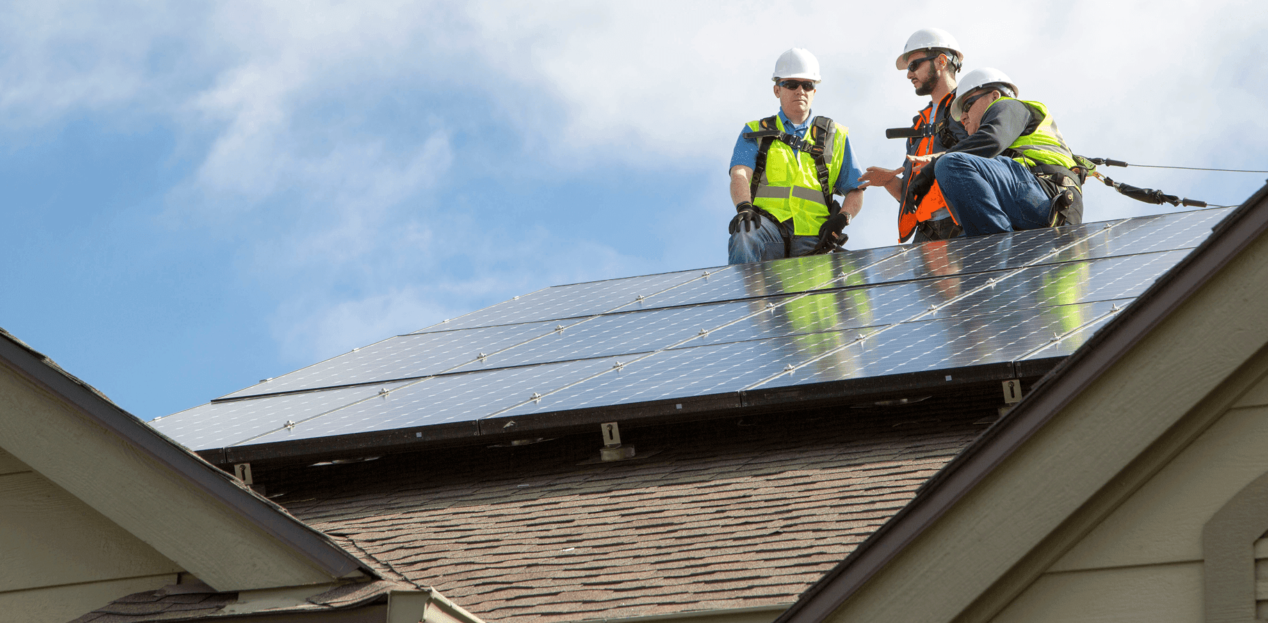 Solar project partners on rooftop